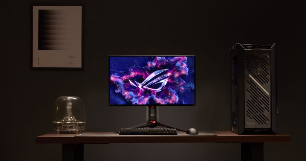 Monitor ASUS ROG Swift OLED con diseño moderno y teclado en un escritorio